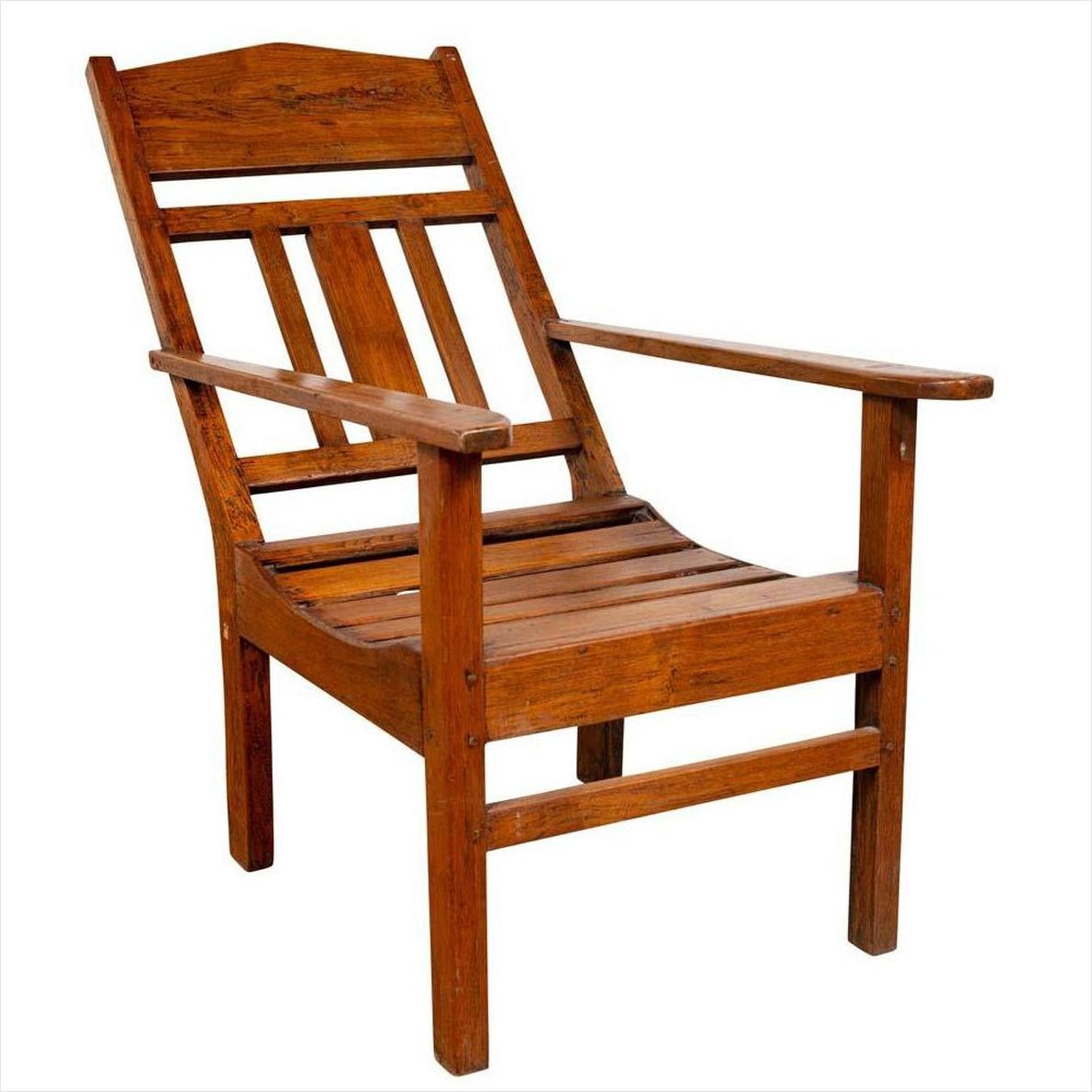 Brown wooden lounge chair with slanted back, vintage Dutch colonial style, on white background.