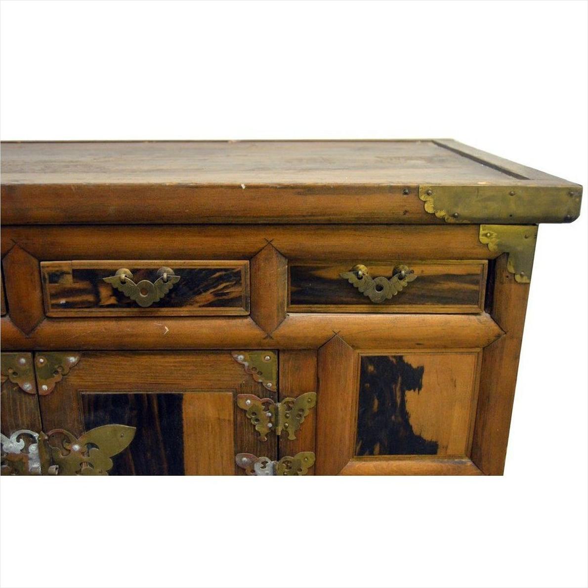 Brown wood Korean chest with butterfly brass hardware, brass-corner accents, and drawers, antique 19th century.