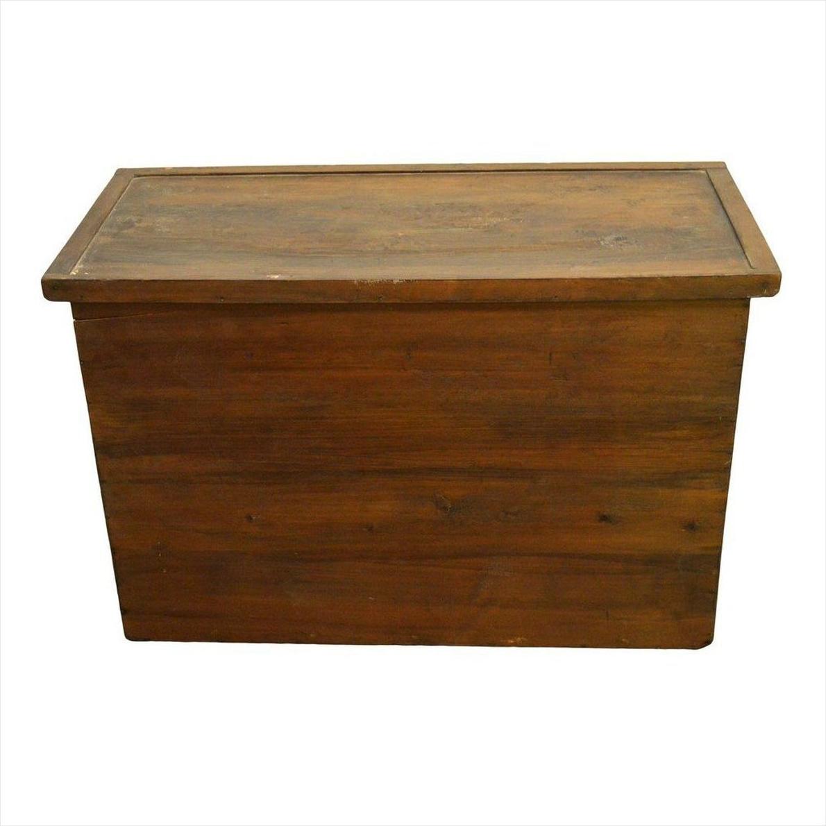 Brown wood chest with butterfly pattern brass hardware, rectangular shape and flat lid, on white background.