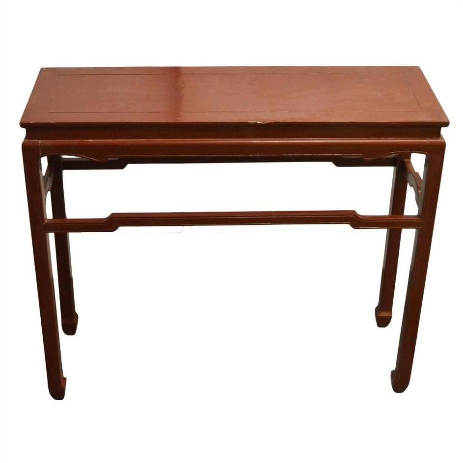 Black lacquered wood Asian altar table with clean lines and straight legs, shown as office room furniture.