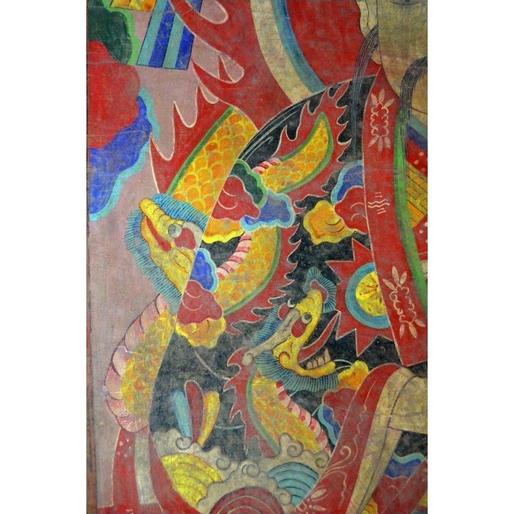Colorful Laotian parchment painting of two dragons with clouds and red ribbons in a clear double plexiglass frame.