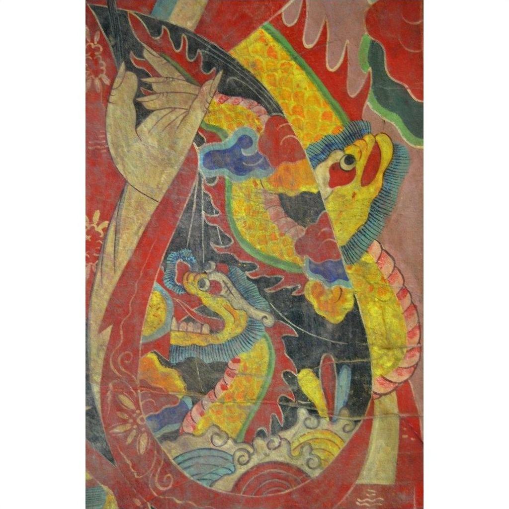Colorful Laotian parchment painting with two dragon-like creatures, swirling clouds, and waves in plexiglass frame.
