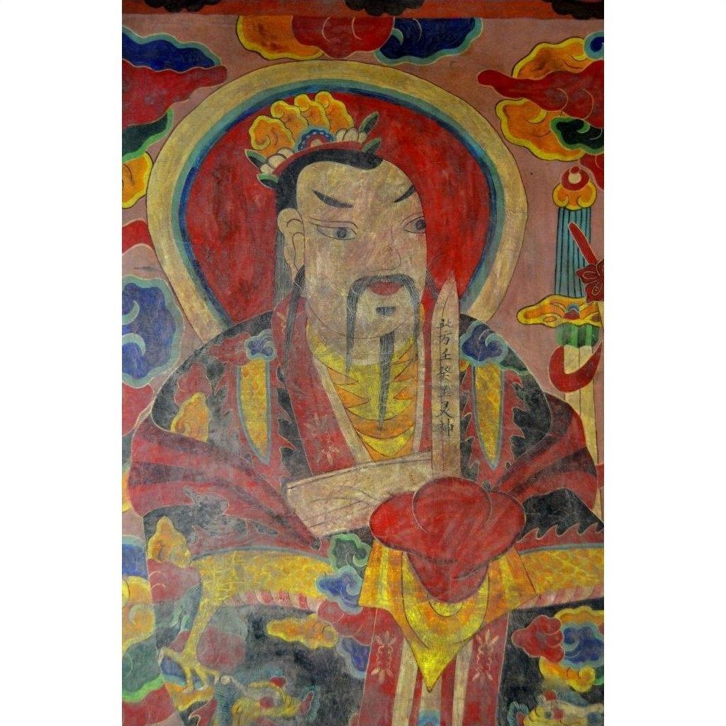 Colorful Laotian parchment painting of bearded man in ornate robes and crown, holding sword and scroll, close-up.