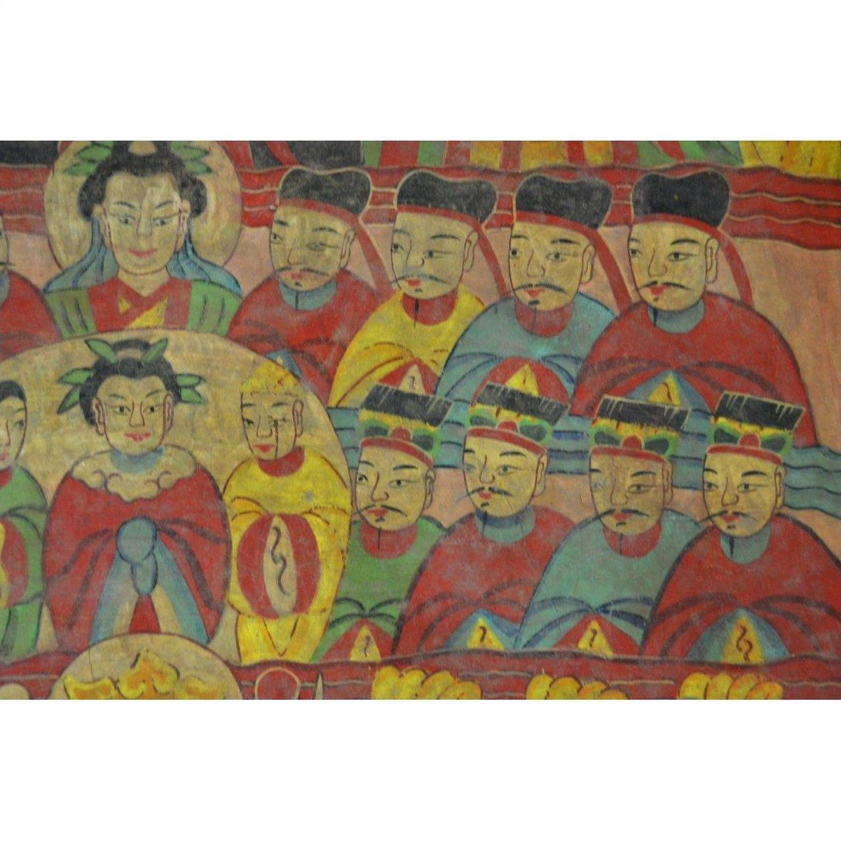 Colorful parchment painting with seated figures in rows, Laotian artwork on paper, forward-facing view.