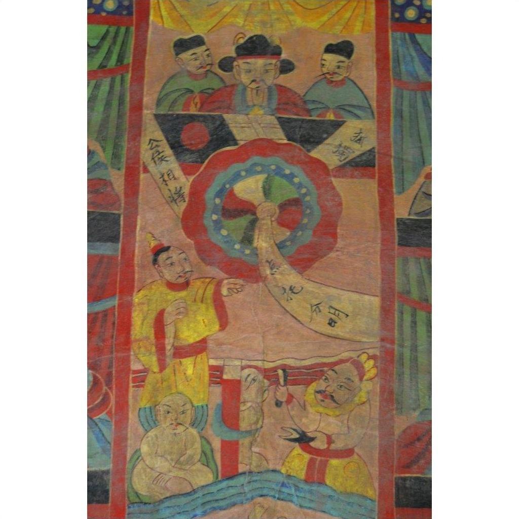 Colorful parchment painting with officials and scrolls, featuring a circular motif, Laotian artwork close-up.