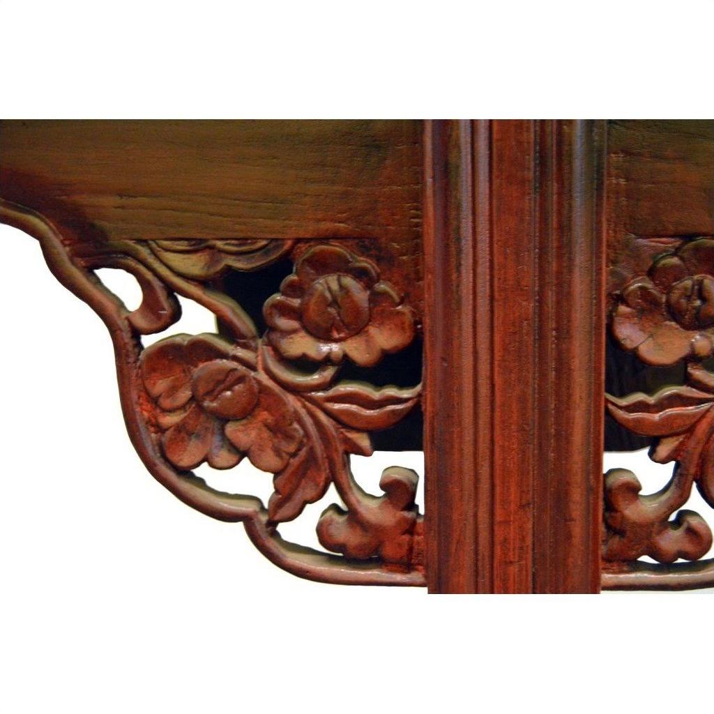 Brown antique carved elm wood altar table with floral patterns and stained finish, set against a white background.