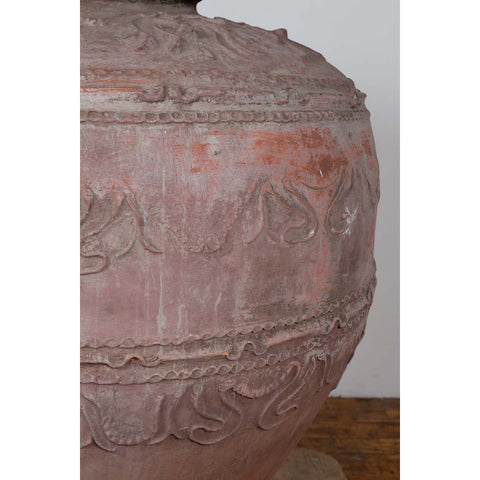 Large Antique Indonesian Terracotta Water Jar with Wavy Patterns and Aged Patina