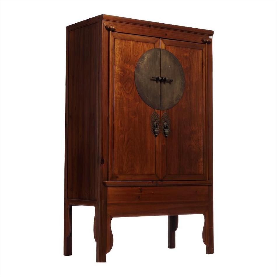 Dark wood armoire with round medallion hardware, curved legs, double doors, and lower drawer, 19th-century Chinese style.