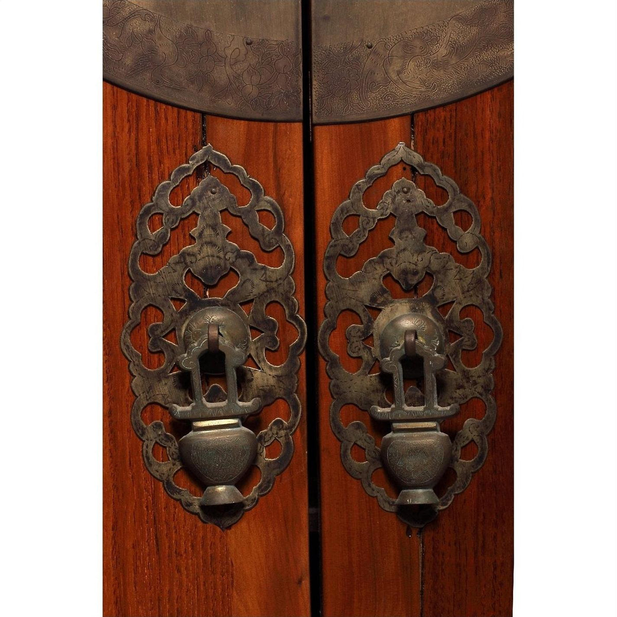 Dark wood large armoire with ornate round medallion hardware, 19th-century Chinese style accents on doors.