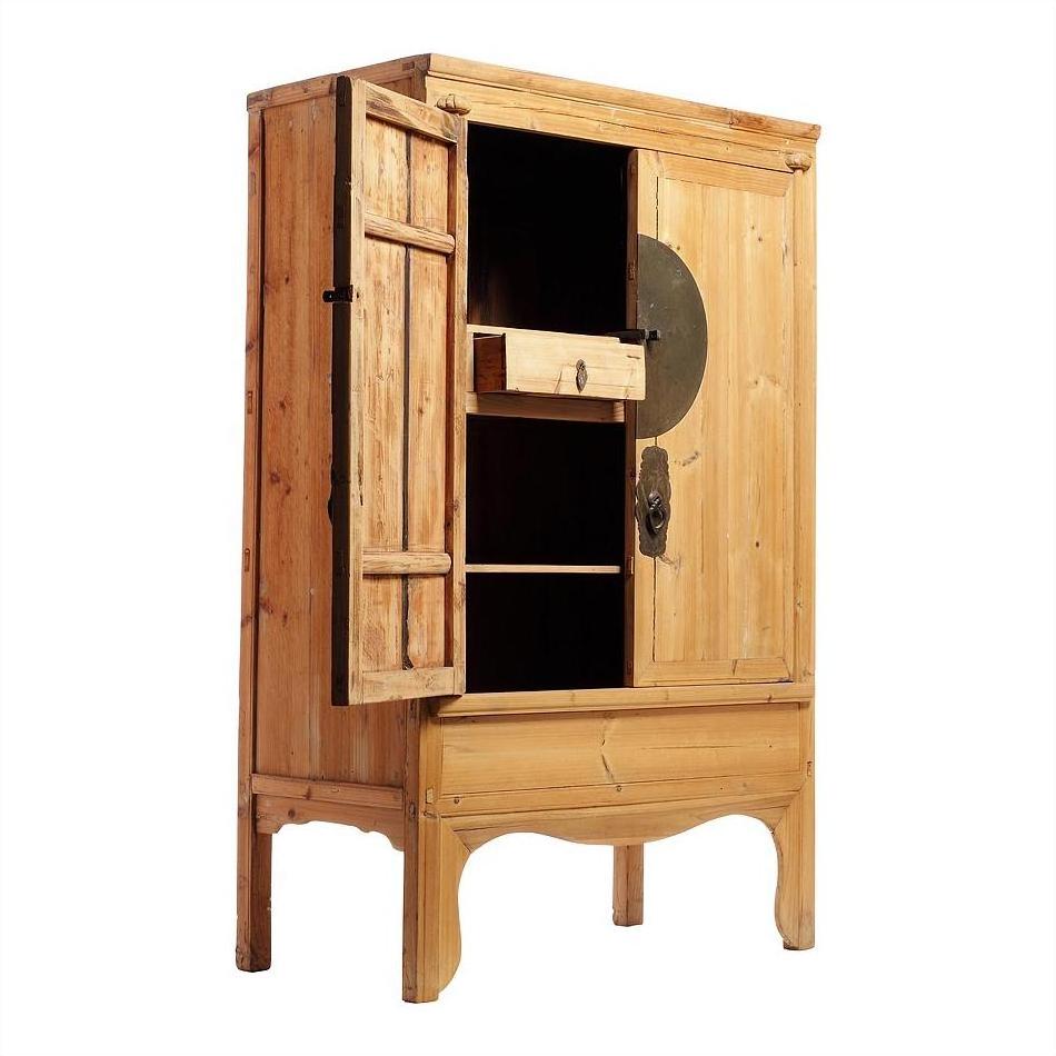 Natural finish wood Chinese armoire with open door, visible shelves, drawer, and round medallion hardware front view.