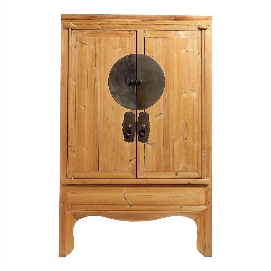 Natural wood Chinese armoire with double doors, medallion hardware, and decorative center handles.