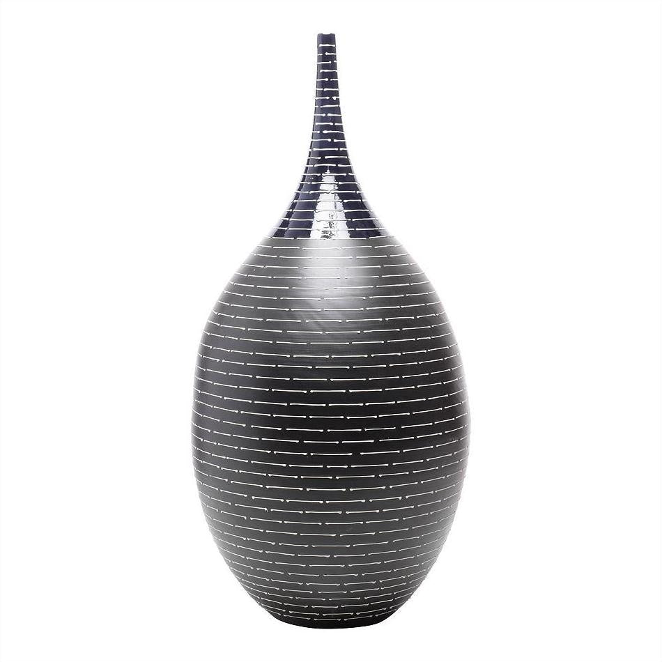 Black handmade ceramic Thai vase with narrow neck and horizontal white lines, close-up, crafted in Northern Thailand.
