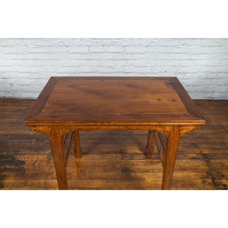 This-is-a-picture-of-a-Late Qing Dynasty Chinese Elm Wine Table with Carved Legs and Side Stretchers-with-image-position-10-style-YN2576-Shop-for-Vintage-and-Antique-Asian-and-Chinese-Furniture-for-sale-at-FEA Home-NYC