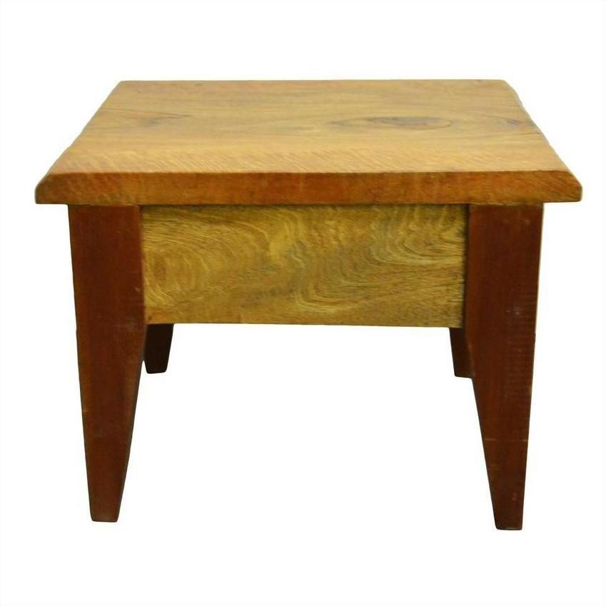 Brown mango wood side table with four legs and flat rectangular top, vintage-inspired design, studio background.