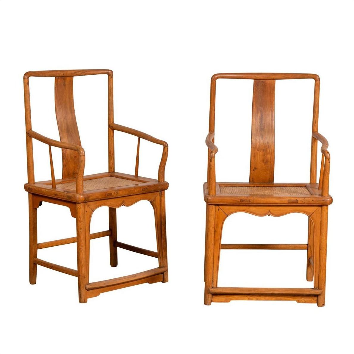 Brown wood and rattan Ming Dynasty style wedding armchairs, curving arms, side and front views.