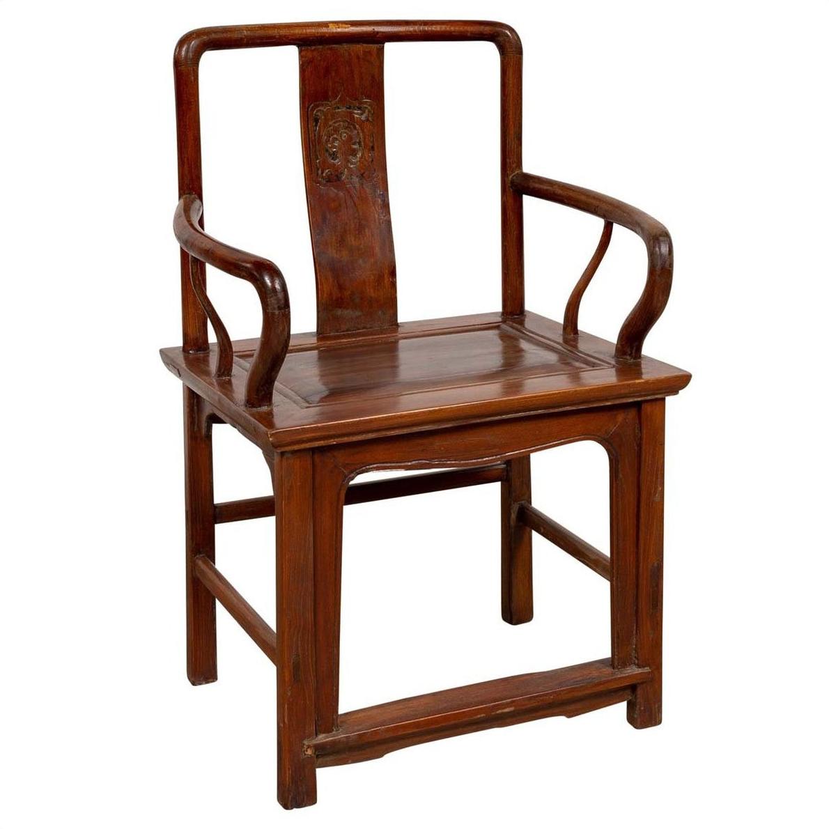 Brown wooden wedding chair with carved medallion and curved arms, Ming Dynasty style, classic design.