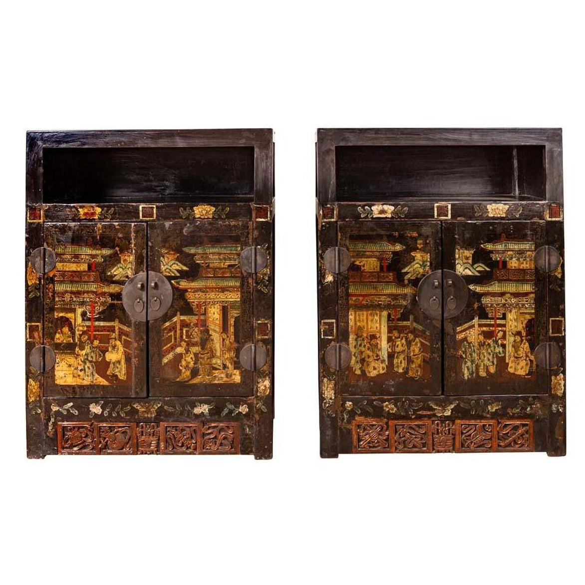 Dark wood Chinese display cabinets with carved panels and hand-painted Chinoiserie motifs, pair, front view.