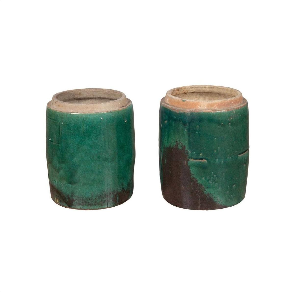 Green ceramic antique Chinese planters with rustic texture, displayed side by side on a white background.
