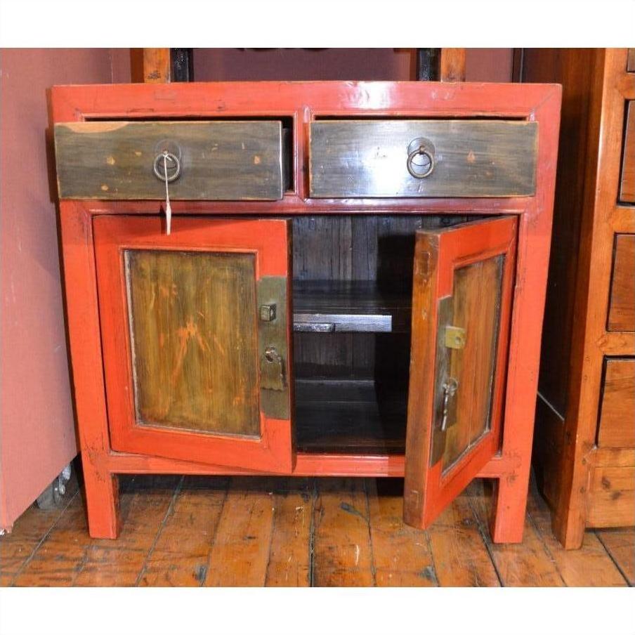 Red bedside cabinets made of wood with open doors and drawers, displayed on a wooden floor, front view.