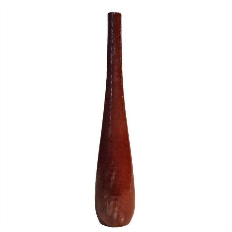 Brown ceramic vase, tall and slender with textured finish, close-up on plain white background.