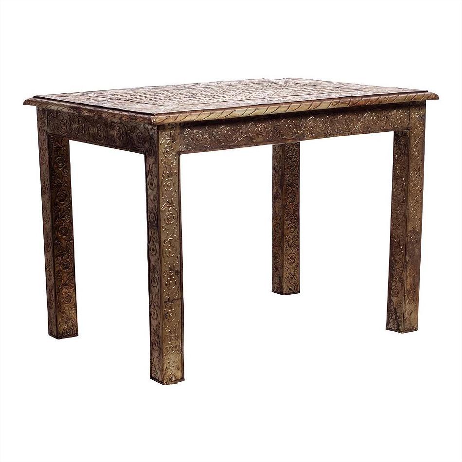 Rectangular hammered silver table with engraved patterns and legs, classic Indian style, close-up view.