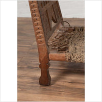 Rustic Indian Low Wooden Chair with Rope Seat and Weathered Appearance
