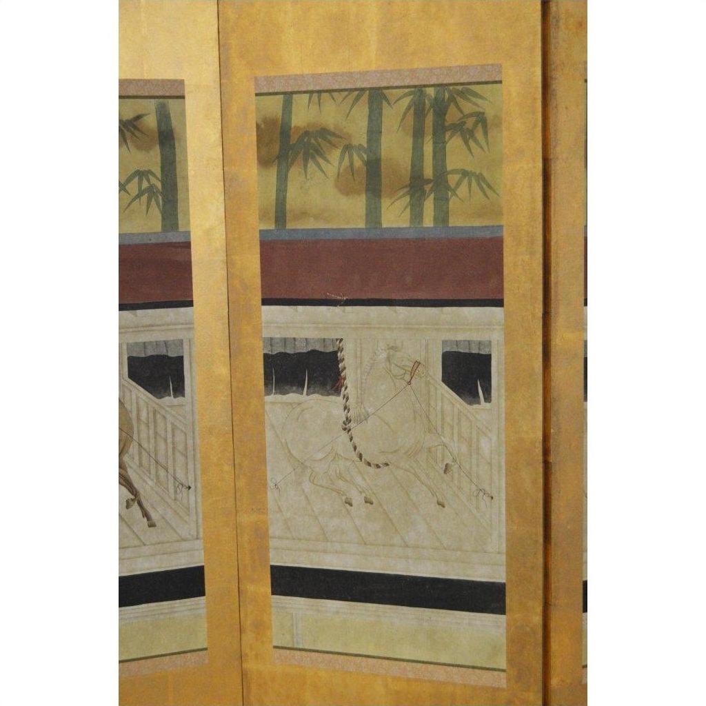 Gold folding screen with four panels, featuring painted bamboo and horses on a metallic golden background.