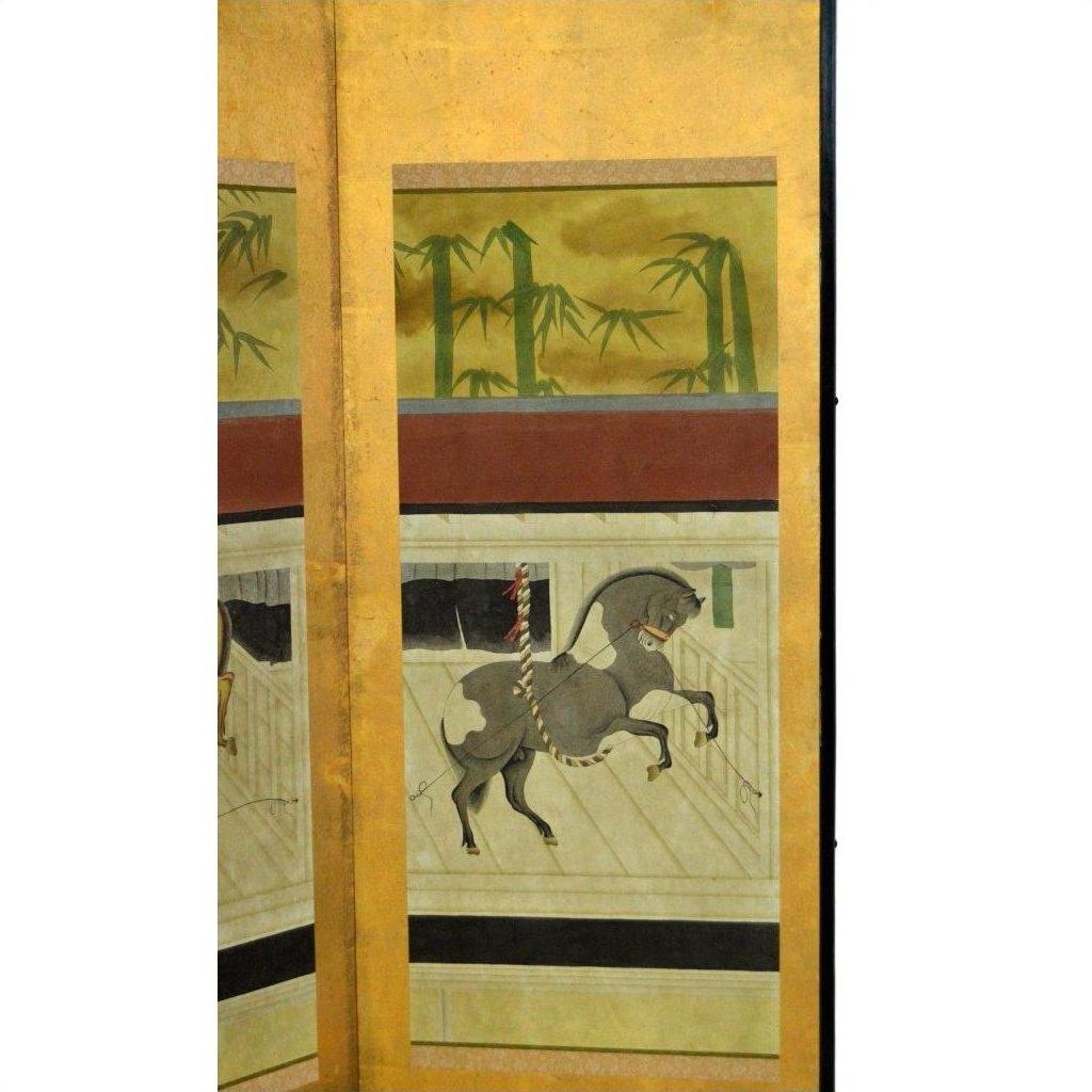 Gold 4-panel screen with painted bamboo and horses, gray horse shown in a wooden enclosure.