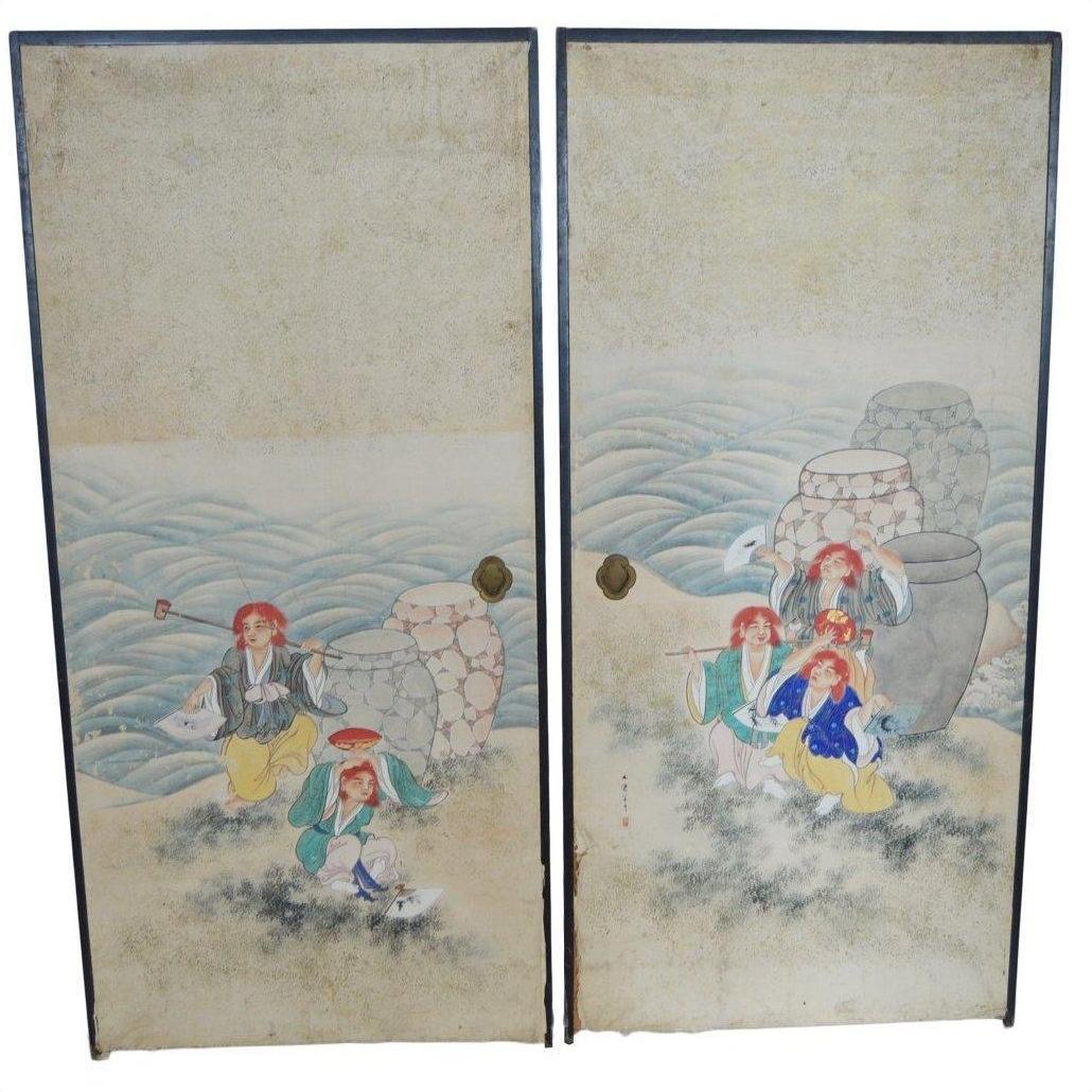 Gold and black Japanese 2-panel screen with painted fictional figures, water jars, bird, and wave motif in background.