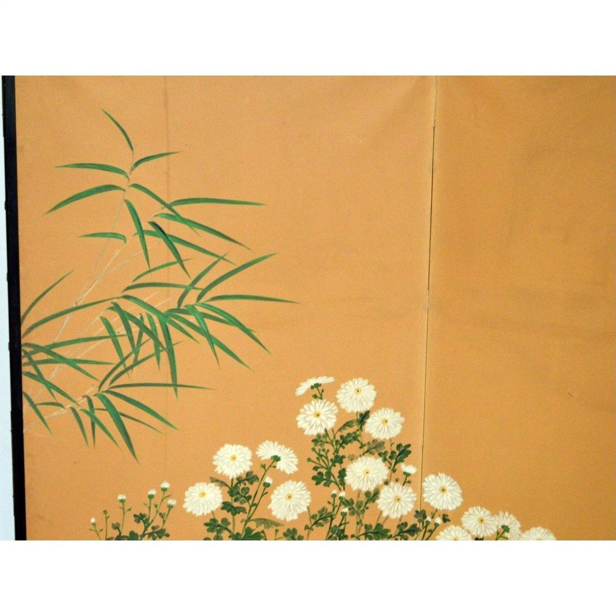 Brown wooden 2-panel screen with painted flowers, birds, and bamboo leaves, used as a floral room divider.