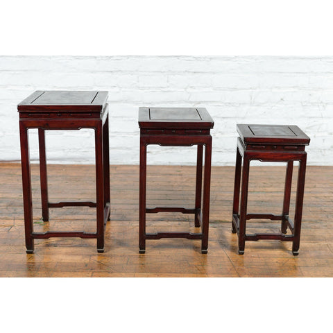 This-is-a-picture-of-a-Set of Three Chinese Vintage Rosewood Nesting Tables with Reddish Brown Patina-image-position-2-style-YN3461-Shop-for-Vintage-and-Antique-Asian-and-Chinese-Furniture-for-sale-at-FEA Home-NYC
