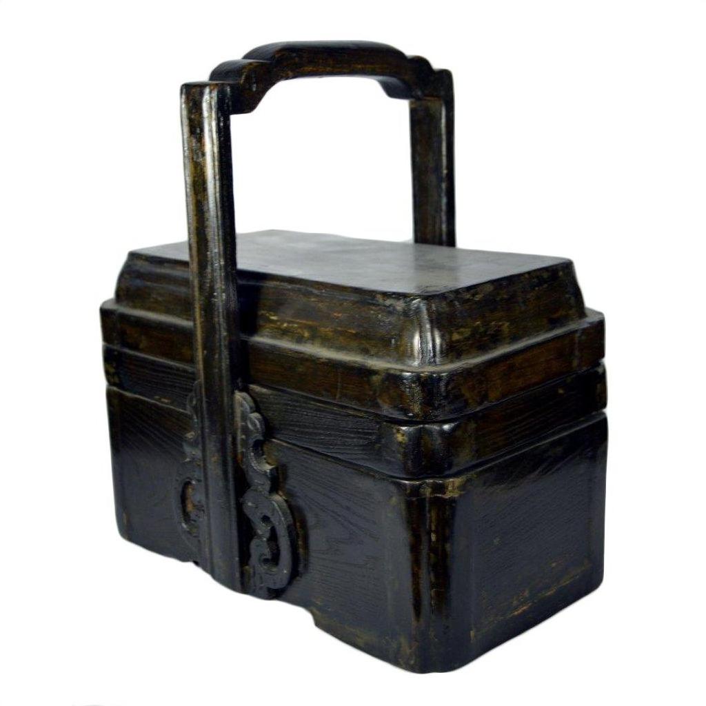 Close-up of vintage dark wood Shandong elm wedding box with handle, ornate clasp, and two stacked compartments.