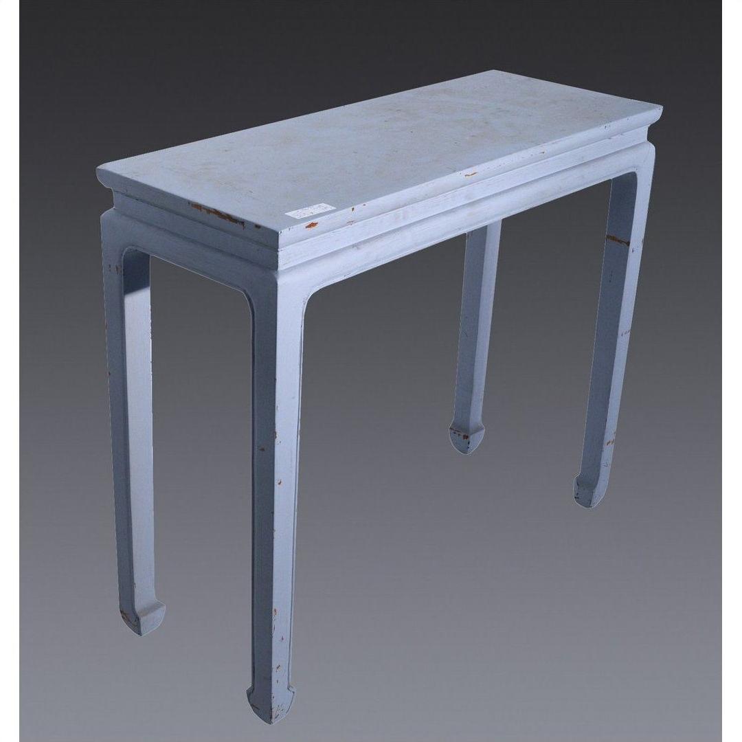 Light blue wooden side table with four straight legs, rectangular top, set against a plain gray background.