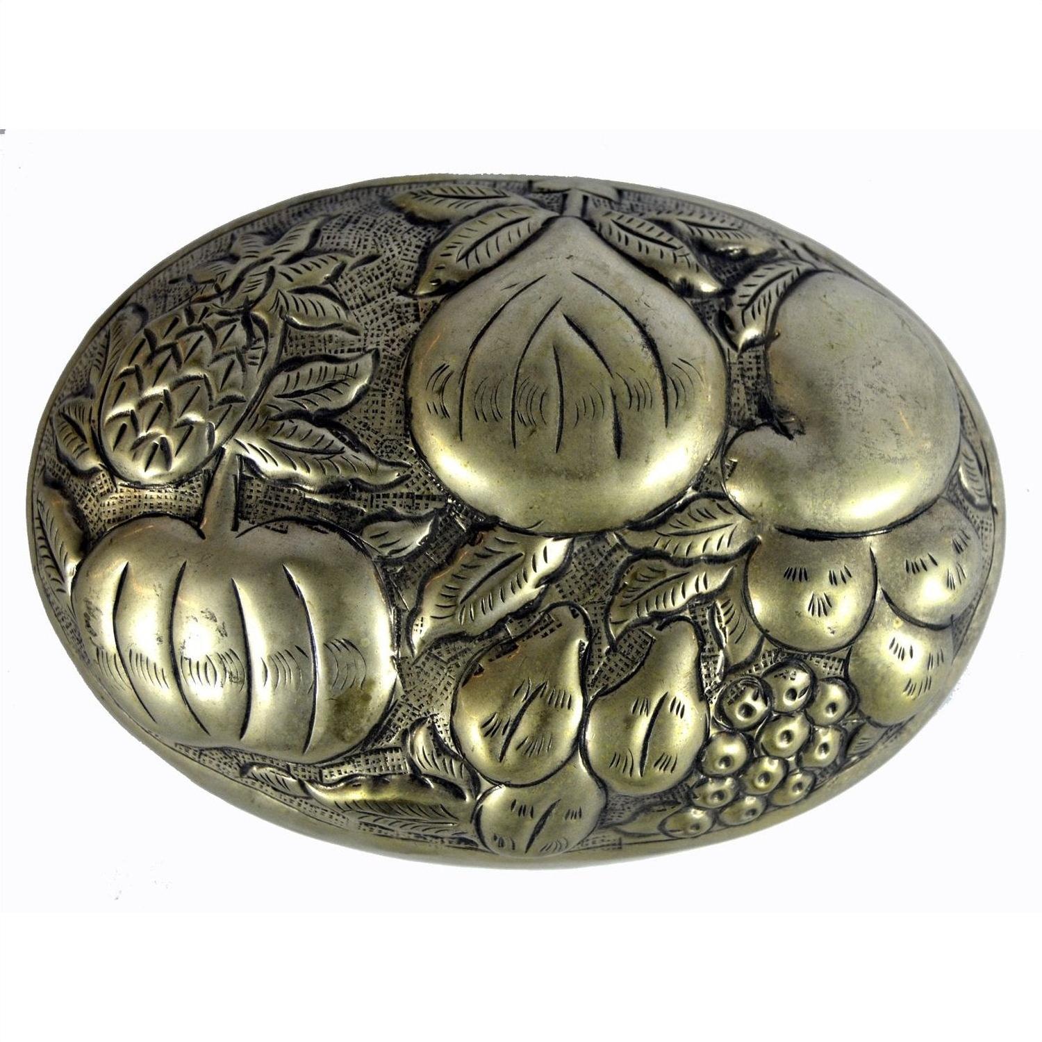 Silver plate jewelry box with oval brass accents and embossed pineapple, apple, and grapes on lid, close-up view.
