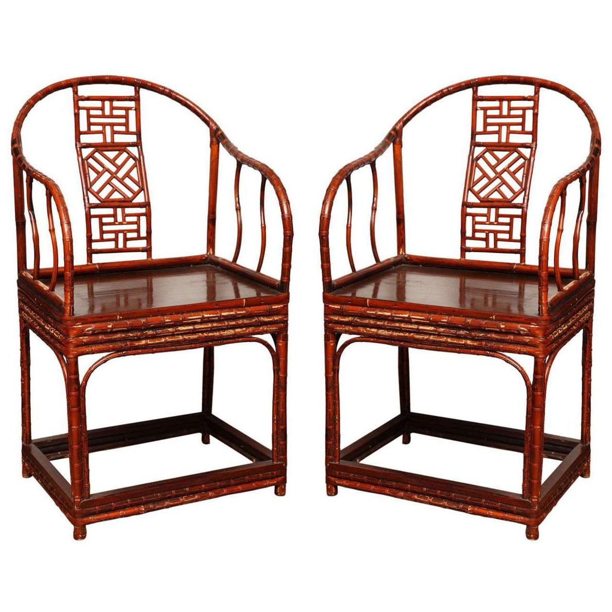 Brown bamboo and elm Chinese horseshoe-back armchair with curved back and intricate details, 19th century.