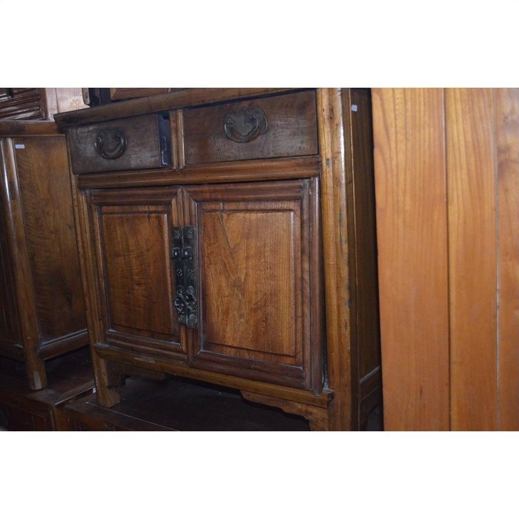 Light brown lacquer small side cabinet with metal handles, 2 drawers, and 2 paneled doors, front view.