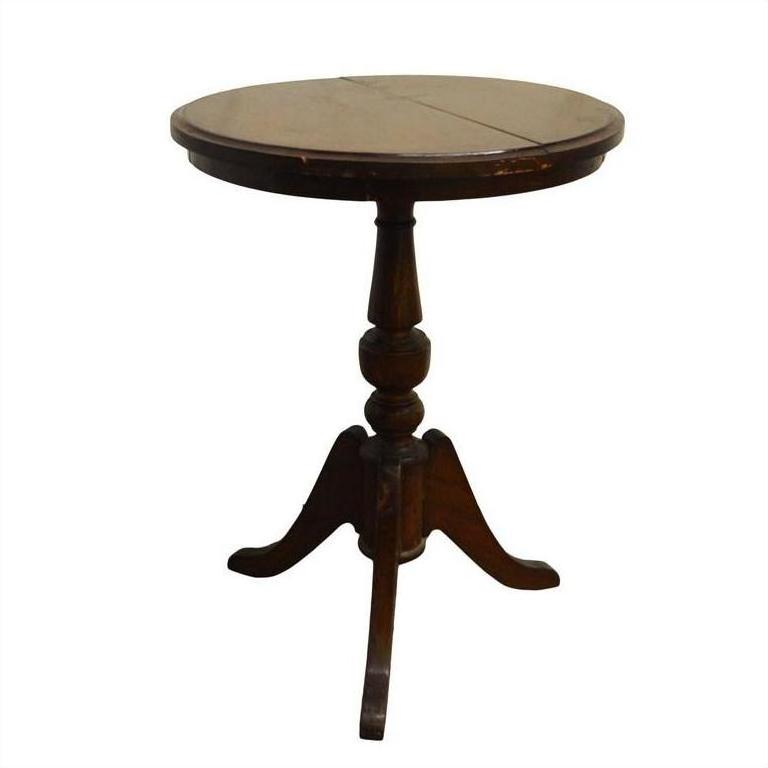 Close-up of a round wooden pedestal table with three curved legs on a plain white background.