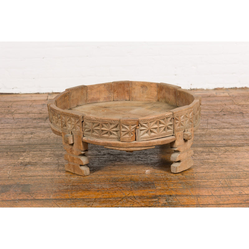 This-is-a-picture-of-a-Teak 1920s Indian Chakki Grinding Table with hand carved Geometric Décor-image-position-2-style-YN7736-Shop-for-Vintage-and-Antique-Asian-and-Chinese-Furniture-for-sale-at-FEA Home-NYC