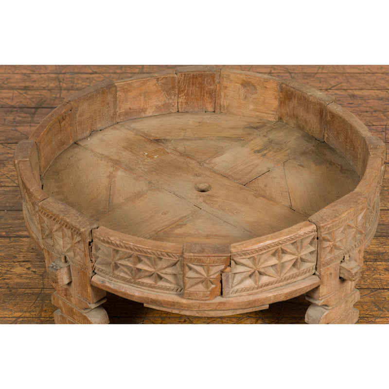 This-is-a-picture-of-a-Teak 1920s Indian Chakki Grinding Table with hand carved Geometric Décor-image-position-3-style-YN7736-Shop-for-Vintage-and-Antique-Asian-and-Chinese-Furniture-for-sale-at-FEA Home-NYC