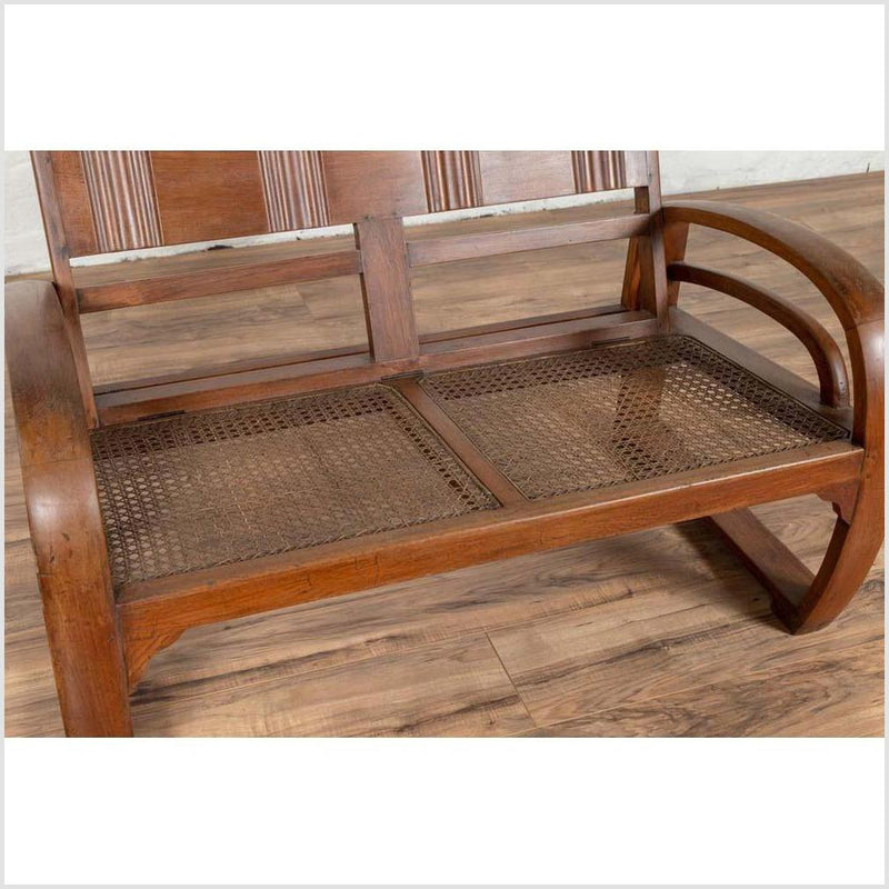 Teak Wood Settee from Madura with Folding Back, Looping Arms and Cane Seat