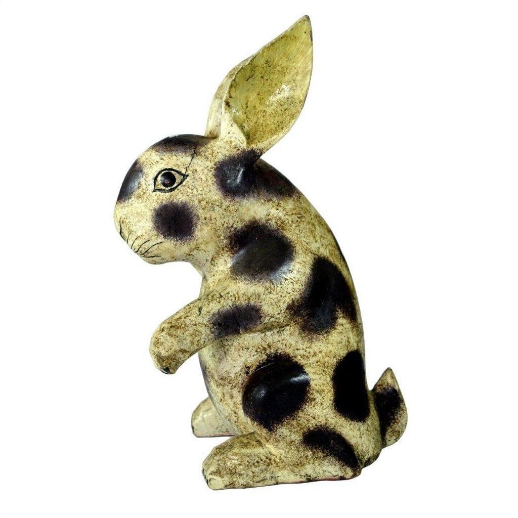 Hand painted Thai Begging Rabbit sculpture with upright ears, sitting on hind legs, left-facing on white background.