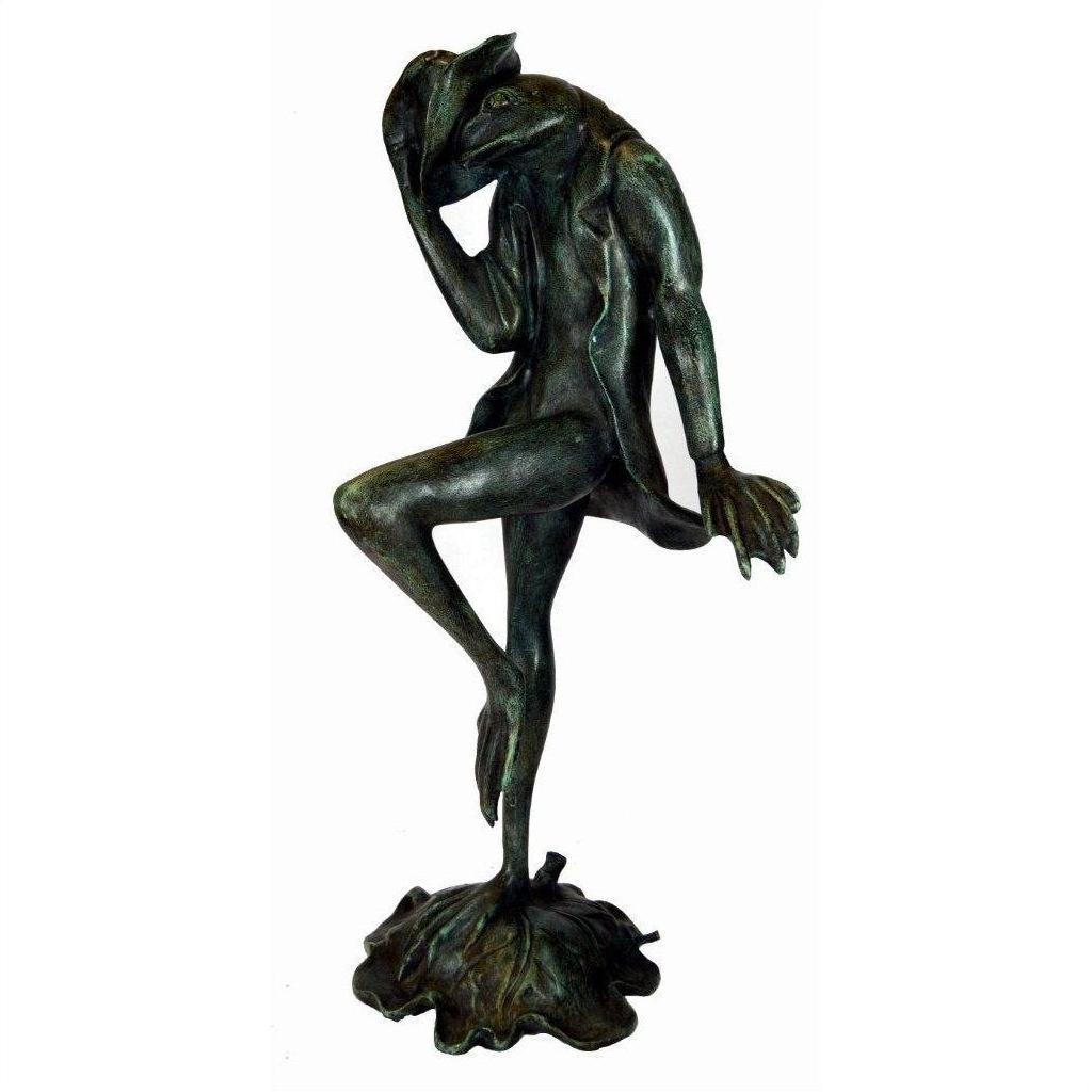 Green-grey bronze frog statue in a suit tipping its hat, lost wax technique, on neutral background.