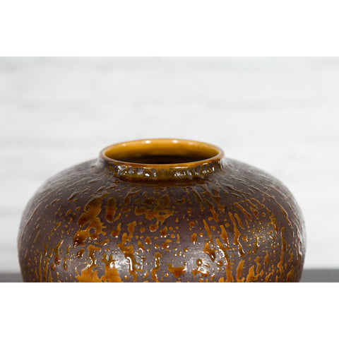 This-is-a-picture-of-a-Vintage Artisan Prem Collection Two-Toned Ceramic Jar with Caramel Toned Glaze-with-image-position-5-style-YN3539-Shop-for-Vintage-and-Antique-Asian-and-Chinese-Furniture-for-sale-at-FEA Home-NYC