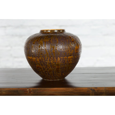 This-is-a-picture-of-a-Vintage Artisan Prem Collection Two-Toned Ceramic Jar with Caramel Toned Glaze-with-image-position-7-style-YN3539-Shop-for-Vintage-and-Antique-Asian-and-Chinese-Furniture-for-sale-at-FEA Home-NYC