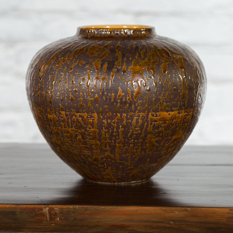 This-is-a-picture-of-a-Vintage Artisan Prem Collection Two-Toned Ceramic Jar with Caramel Toned Glaze-with-image-position-8-style-YN3539-Shop-for-Vintage-and-Antique-Asian-and-Chinese-Furniture-for-sale-at-FEA Home-NYC