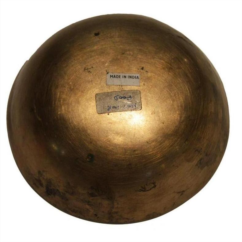 Brass vintage Indian offering bowl, round, shown upside down with two stickers, including one marked MADE IN INDIA.