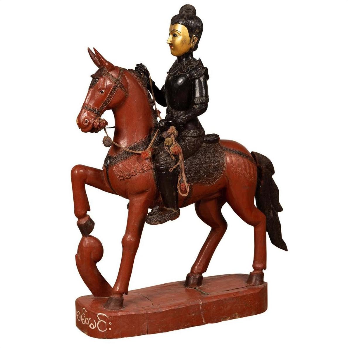 Polychrome wooden Burmese warrior statue on horseback, vintage style, standing on rectangular base.