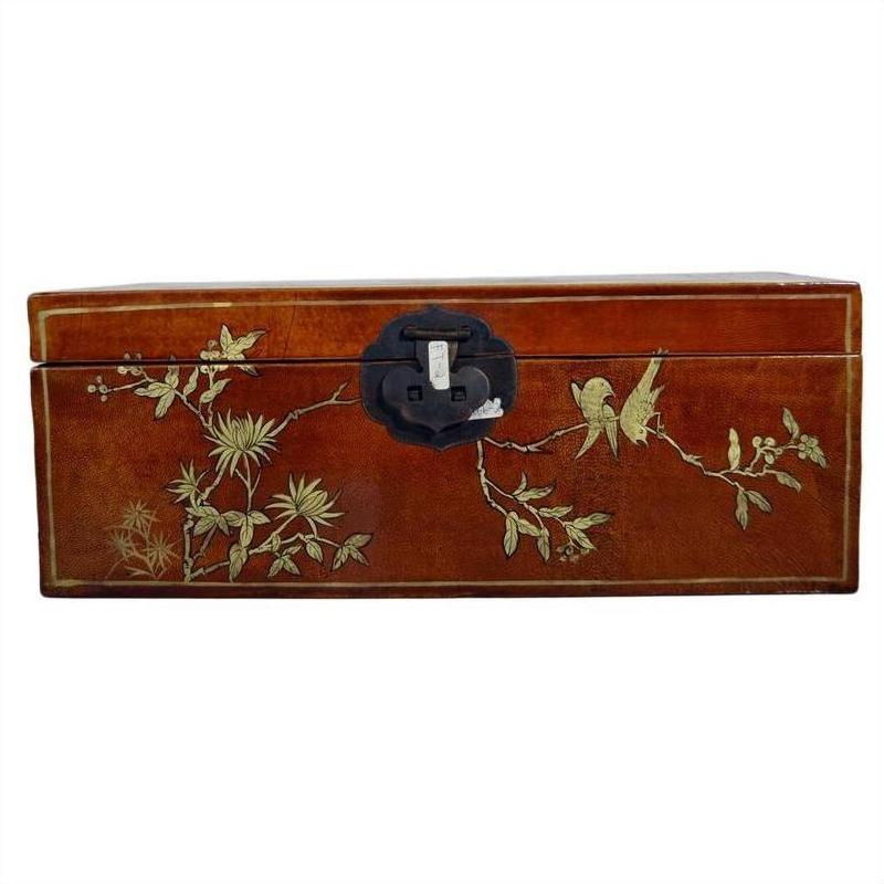 Black lacquered Chinese dowry box with hand-painted floral and bird motifs, vibrant colors, central metal latch, close-up.