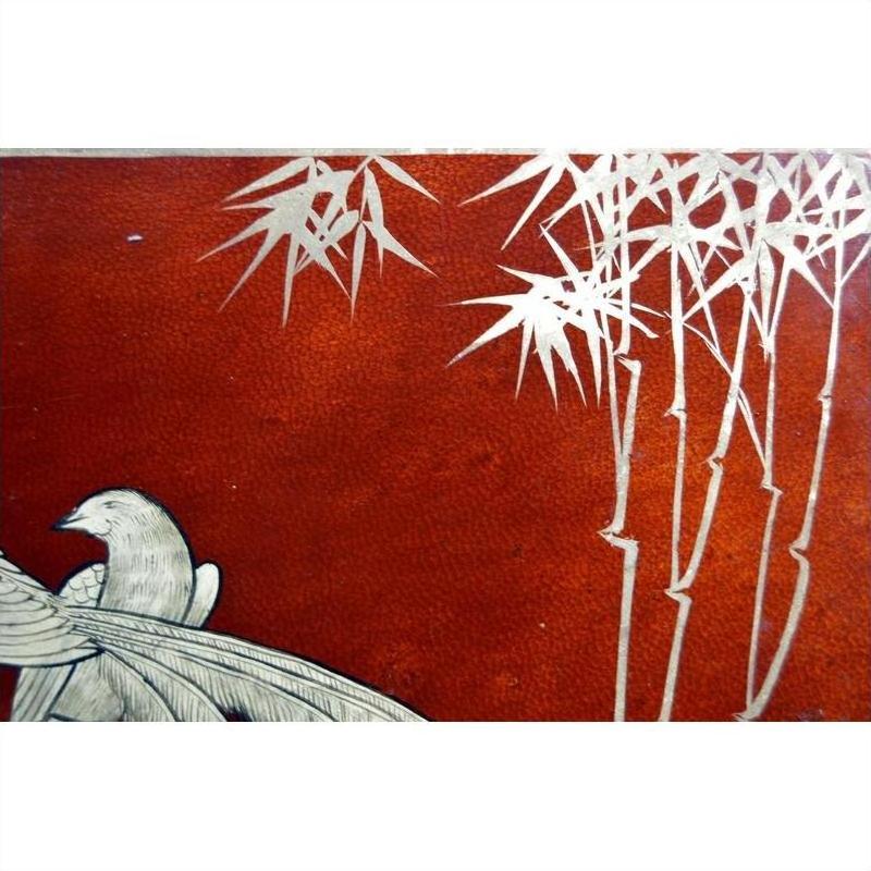 Red lacquered box with white bird and bamboo branch design, hand painted, on a vintage Chinese dowry box.
