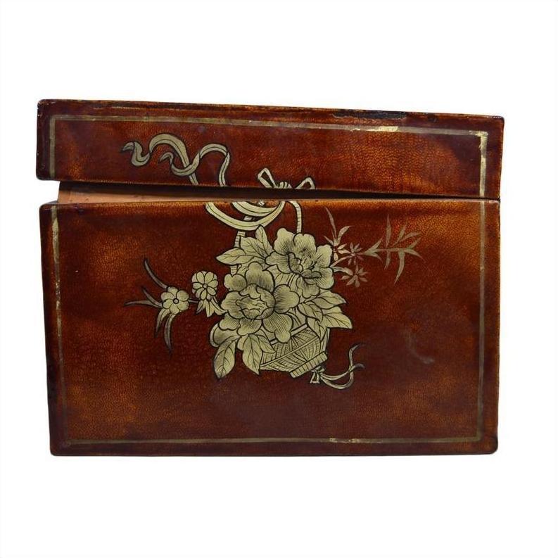 Black lacquered wood box with hand-painted gold floral and ribbon design, vintage Chinese style, front view.